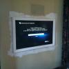 I 40" plasma was mounted in the wall during constuction. We replaced it with a 46" LED and did the trim around the TV. On the same day we brought in Sill Painting to patch and paint the entire wall and new trim for a seemless finish